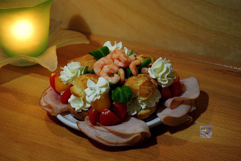 Small homemade beignets with cream cheese