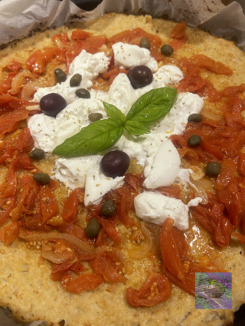 A bed of cauliflower instead of pizza dough. It tastes so good